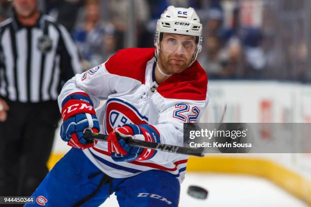 Karl Alzner of the Montreal Canadiens shoots the puck against the Toronto Maple Leafs during the third period at the Air Canada Centre on April 7,...