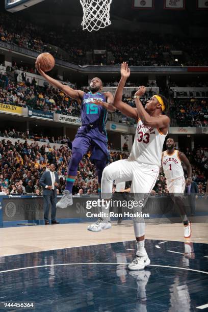 Kemba Walker of the Charlotte Hornets shoots the ball during the game against the Indiana Pacers on April 10, 2018 at Bankers Life Fieldhouse in...