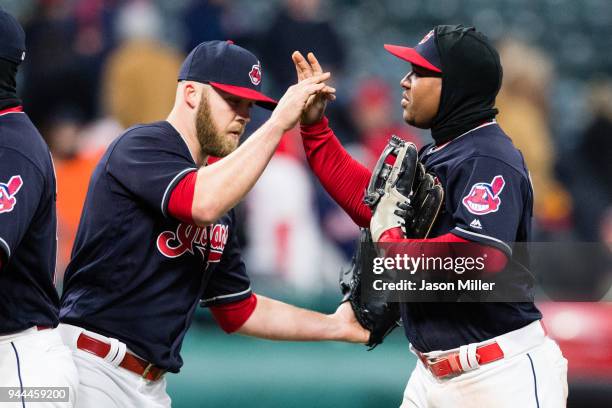 Closing pitcher Cody Allen celebrates with Jose Ramirez of the Cleveland Indians after the Indians defeated the Detroit Tigers at Progressive Field...