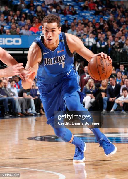 Dwight Powell of the Dallas Mavericks handles the ball during the game against the Phoenix Suns on April 10, 2018 at the American Airlines Center in...