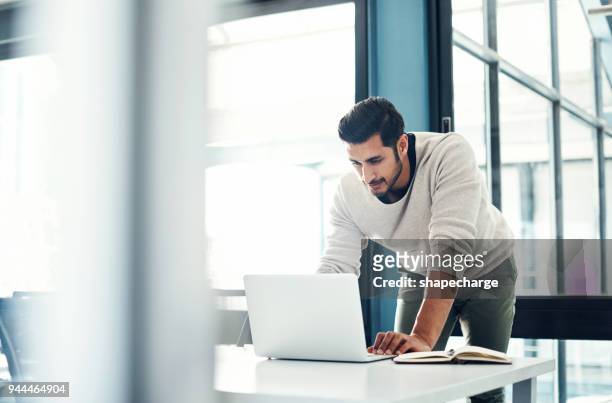 he puts his all into every task - confident desk man text space stock pictures, royalty-free photos & images