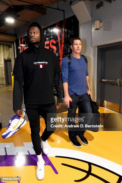 Julius Randle and Luke Walton of the Los Angeles Lakers arrive at the arena before the game against the Houston Rockets on April 10, 2017 at STAPLES...