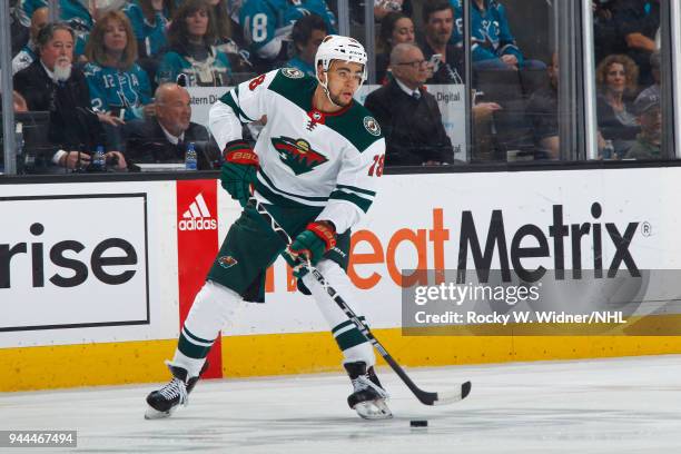 Jordan Greenway of the Minnesota Wild skates with the puck against the San Jose Sharks at SAP Center on April 7, 2018 in San Jose, California. Jordan...