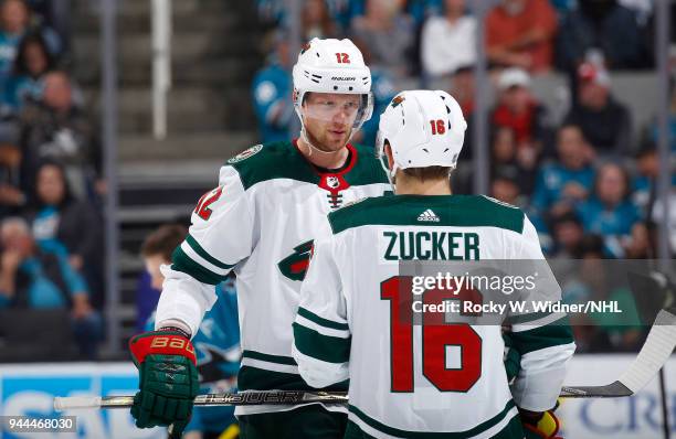 Eric Staal and Jason Zucker of the Minnesota Wild talk during the game against the San Jose Sharks at SAP Center on April 7, 2018 in San Jose,...