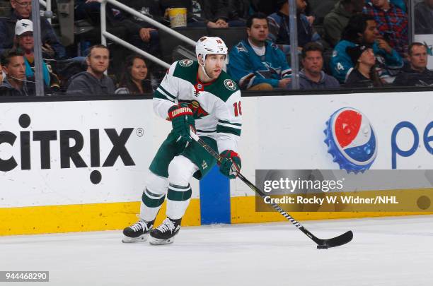 Jason Zucker of the Minnesota Wild skates with the puck against the San Jose Sharks at SAP Center on April 7, 2018 in San Jose, California. Jason...