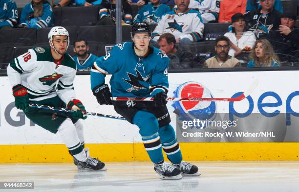 Tomas Hertl of the San Jose Sharks skates against Jordan Greenway of the Minnesota Wild at SAP Center on April 7, 2018 in San Jose, California. Tomas...