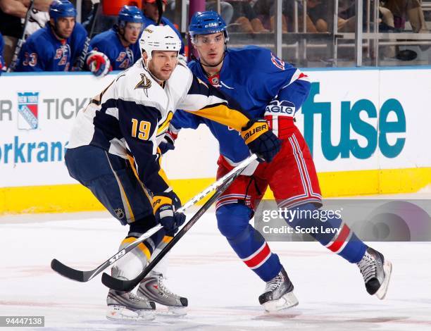 Ales Kotalik of the New York Rangers looks for the puck against Tim Connolly of the Buffalo Sabres on December 12, 2009 at Madison Square Garden in...