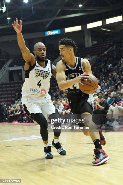 Nick Johnson of the Austin Spurs passes the ball against Lorenzo Brown of the Raptors 905 during Round Two of the NBA G-League playoffs on April 10,...