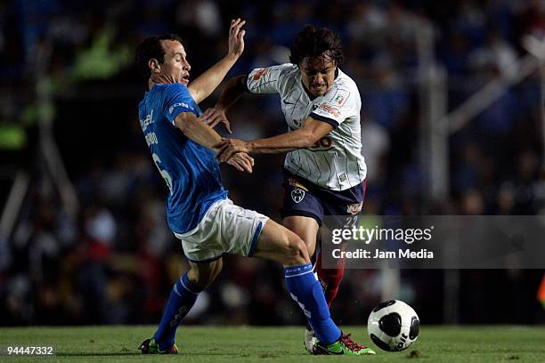 Cruz Azul's Gerardo Torrado vies for the ball with William Paredes of Monterrey during the final match valid for the 2009 Apertura tournament, the...