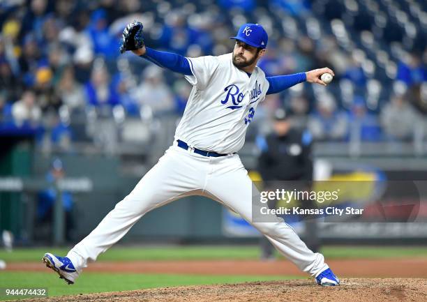 Kansas City Royals relief pitcher Brian Flynn throws in the sixth inning against the Seattle Mariners on Tuesday, April 10 at Kauffman Stadium in...