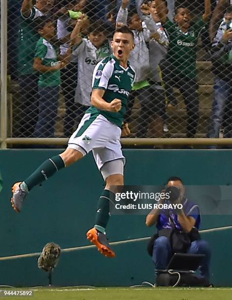 Colombia's Cali player Nicolas Benedetti celebrate his goal against Uruguay's Danubio during their Copa Sudamericana football match at the Palmaseca...