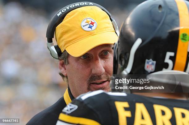 Linebackers coach Keith Butler of the Pittsburgh Steelers talks with linebacker James Farrior during a game against the Cincinnati Bengals at Heinz...