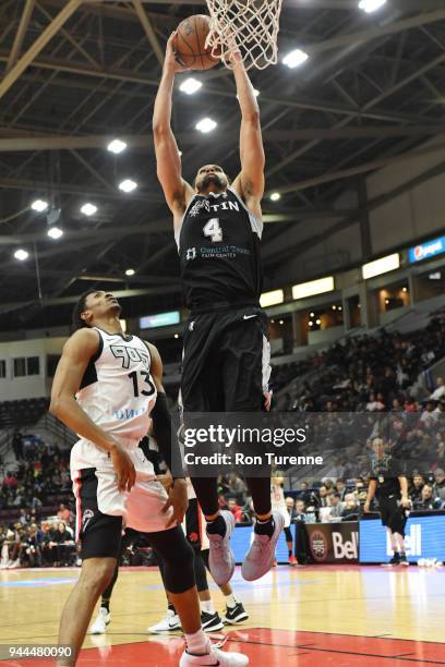 Derrick White of the Austin Spurs drives to the basket during the game against Malcolm Miller of the Raptors 905 during Round Two of the NBA G-League...
