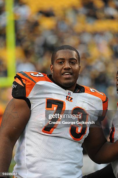 Offensive lineman Anthony Collins of the Cincinnati Bengals looks on from the sideline during a game against the Pittsburgh Steelers at Heinz Field...