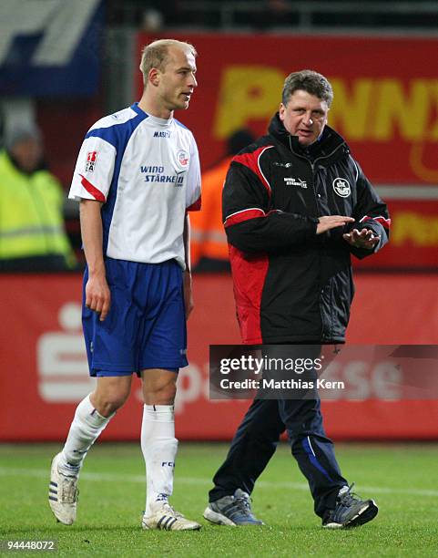 Tim Sebastian of Rostock and head coach Andreas Zachhuber are seen after the Second Bundesliga match between FC Energie Cottbus and FC Hansa Rostock...