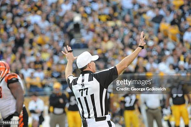 National Football League referee Terry McAulay signals during a game between the Cincinnati Bengals and Pittsburgh Steelers at Heinz Field on...