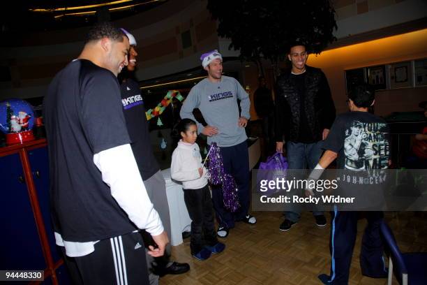Sean May, Jason Thompson, Jon Brockman and Kevin Martin of the Sacramento Kings are all smiles on December 13, 2009 at Shriners Hospital for Children...
