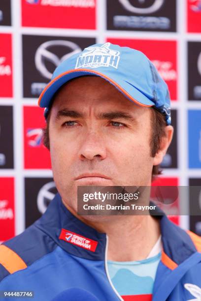 Brad Scott, Senior Coach of the Kangaroos speaks to the media before a Noth Melbourne training session at Arden Street Ground on April 11, 2018 in...