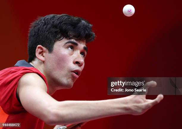 Kim Daybell of England competes against Mohamad Azwar Bakar of Malaysia in the Men's TT6-10 Singles game during Table Tennis on day seven of the Gold...