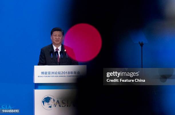 China's President Xi Jinping delivers a speech promising more opening-up of the economy at the Boao Forum for Asia in Boao in south China's Hainan...