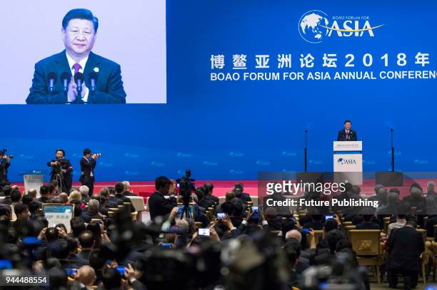 China's President Xi Jinping delivers a speech promising more opening-up of the economy at the Boao Forum for Asia in Boao in south China's Hainan...