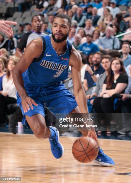 Aaron Harrison of the Dallas Mavericks shoots the ball during the game against the Phoenix Suns on April 10, 2018 at the American Airlines Center in...