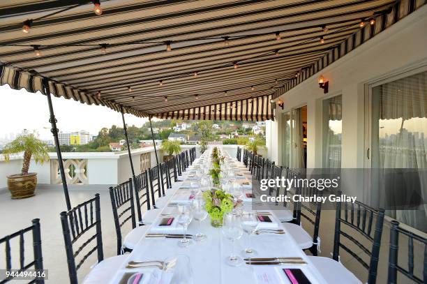 View of the table and atmosphere at Paul Smith's intimate dinner with Gary Oldman at Chateau Marmont on April 10, 2018 in Los Angeles, California.