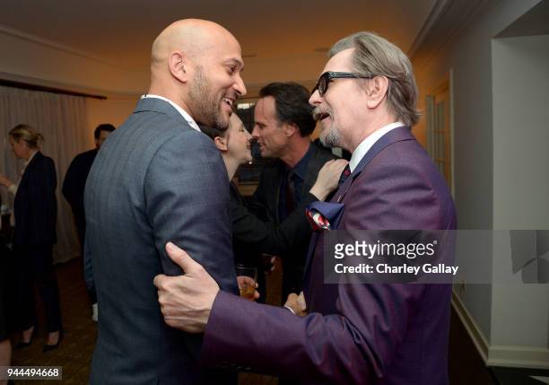 Keegan-Michael Key and Gary Oldman, wearing Paul Smith, attend Paul Smith's intimate dinner with Gary Oldman at Chateau Marmont on April 10, 2018 in...
