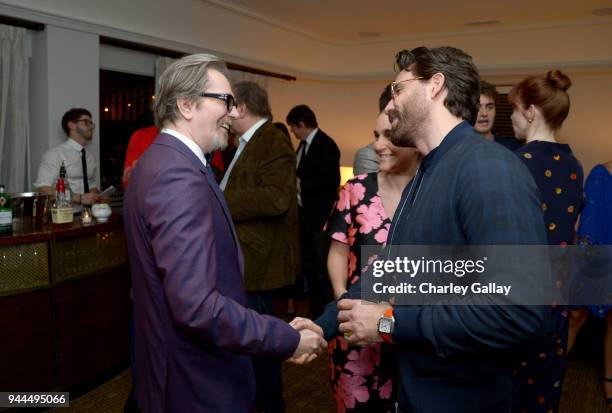 Gary Oldman and Edgar Ramirez, wearing Paul Smith, attend Paul Smith's intimate dinner with Gary Oldman at Chateau Marmont on April 10, 2018 in Los...