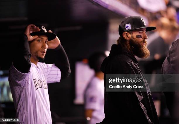 Colorado Rockies center fielder Charlie Blackmon, right, and Colorado Rockies right fielder Carlos Gonzalez in the dugout during the game against the...