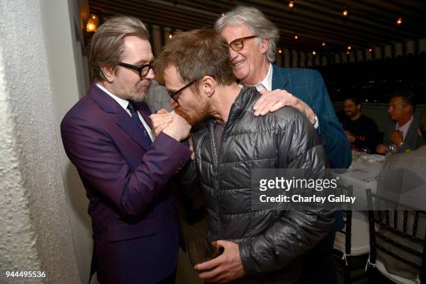 Gary Oldman, Sam Rockwell, and Paul Smith, wearing Paul Smith, attend Paul Smith's intimate dinner with Gary Oldman at Chateau Marmont on April 10,...