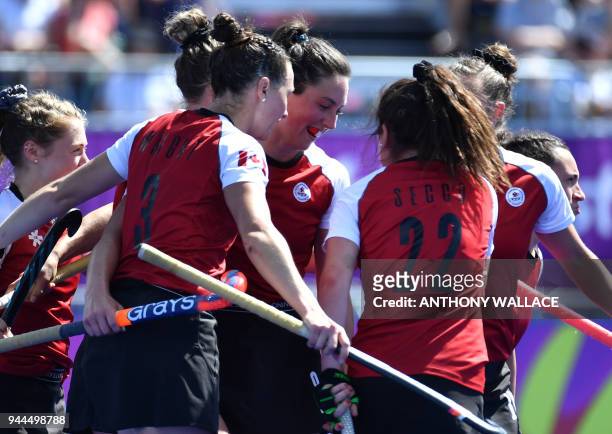 Danielle Hennig of Canada celebrates after scoring a goal during the women's field hockey match between Canada and Ghana at the 2018 Gold Coast...