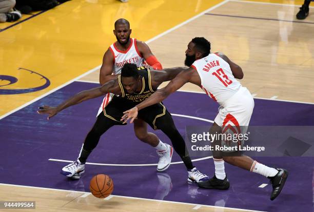 Julius Randle of the Los Angeles Lakers plays against Chris Paul and James Harden of the Houston Rockets on on April 10, 2018 at STAPLES Center in...