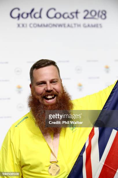 Gold medalist Daniel Repacholi of Australia poses during the medal ceremony for the Men's 50m Pistol Finals on day seven of the Gold Coast 2018...
