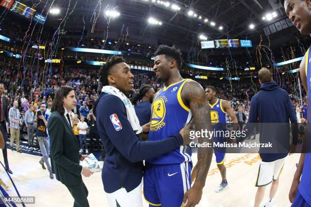 Donovan Mitchell of the Utah Jazz and Jordan Bell of the Golden State Warriors talk after the game on April 10, 2018 at vivint.SmartHome Arena in...