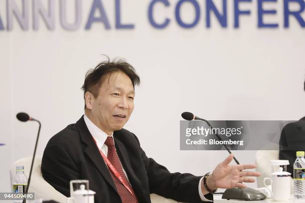 Kazumasa Iwata, president of the Japan Center for Economic Research, speaks during a panel discussion at the Boao Forum for Asia Annual Conference in...