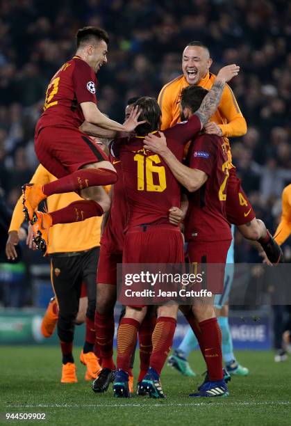 Stephan El Shaarawy, Radja Nainggolan of AS Roma and teammates celebrate the qualification for the semis following the UEFA Champions League Quarter...