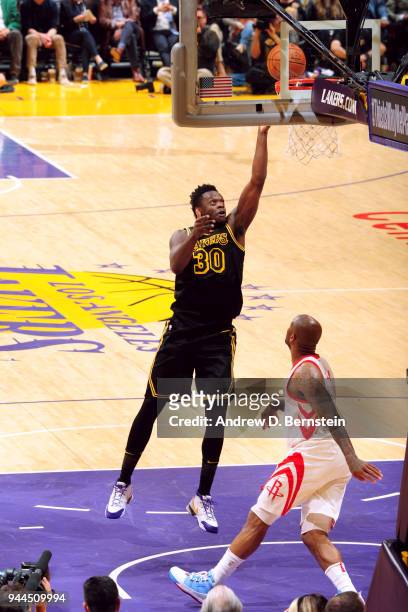 Julius Randle of the Los Angeles Lakers goes to the basket against the Houston Rockets on April 10, 2017 at STAPLES Center in Los Angeles,...