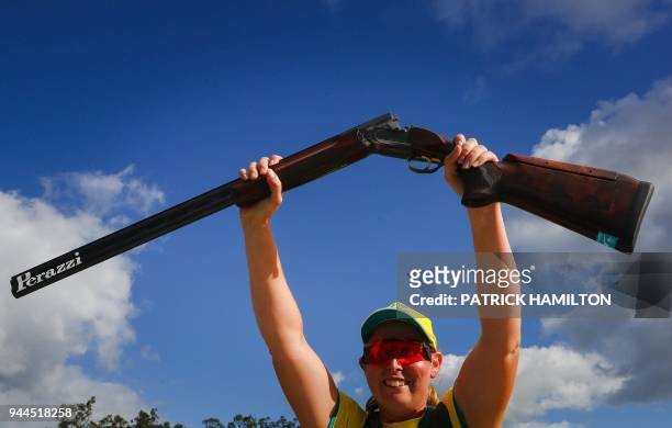 Australia's Emma Cox celebrates winning the silver medal during the women's double trap shooting event finals in the 2018 Gold Coast Commonwealth...