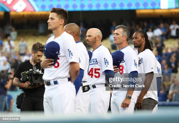 Player Todd Gurley stands for the National Anthem prior to The Los Angeles Dodgers Game at Dodger Stadium on April 10, 2018 in Los Angeles,...