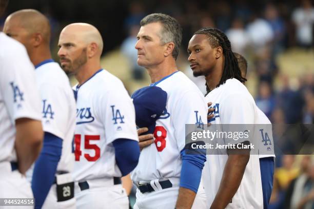 Player Todd Gurley stands for the National Anthem prior to The Los Angeles Dodgers Game at Dodger Stadium on April 10, 2018 in Los Angeles,...