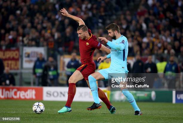 Edin Dzeko of AS Roma, Gerard Pique of Barcelona during the UEFA Champions League Quarter Final second leg match between AS Roma and FC Barcelona at...