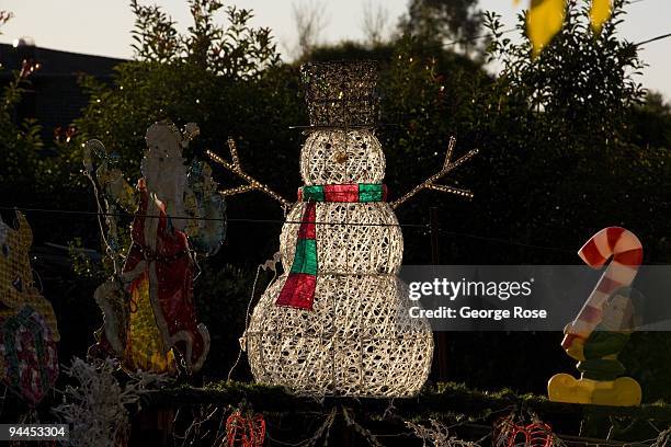 Frontyard plastic snowman is seen in this 2009 Healdsburg, Russian River Valley, Sonoma County, California, late fall landscape photo.