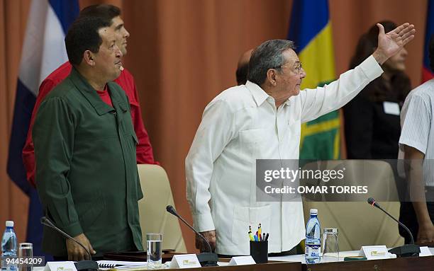 Cuban President Raul Castro addresses the audience next to Venezuelan President Hugo Chavez during the closing ceremony of the Bolivarian Alternative...