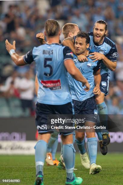 Matthew Simon of the Sydney celebrates scoring a goal with teammate Deyvison Rogerio da Silva, Bobo during the round 26 A-League match between Sydney...