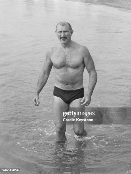 American actor Lee Van Cleef goes swimming during the 28th Venice International Film Festival, Italy, 1967.