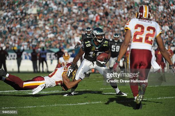 Wide Receiver Jeremy Macklin of the Philadelphia Eagles gets tackled during the game against the Washington Redskins on November 29, 2009 at Lincoln...