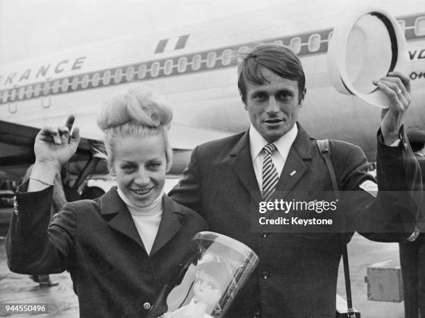 Czechoslovakian gymnast Vera Caslavska and her husband, runner Josef Odlozil arrive at Orly Airport near Paris, France, en route to Prague, 29th...