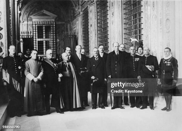 British Prime Minister Neville Chamberlain and Foreign Secretary Lord Halifax with Vatican officials after being given an audience with the Pope,...