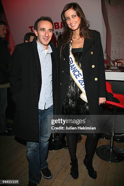 Miss France 2009 Malika Menard and Elie Semoun attend the Toshiba 'Go to Space' party at Palais De Tokyo on December 14, 2009 in Paris, France.